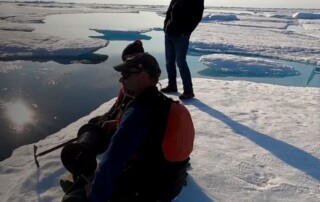Scientists profile down to the bottom of the ocean with instruments.